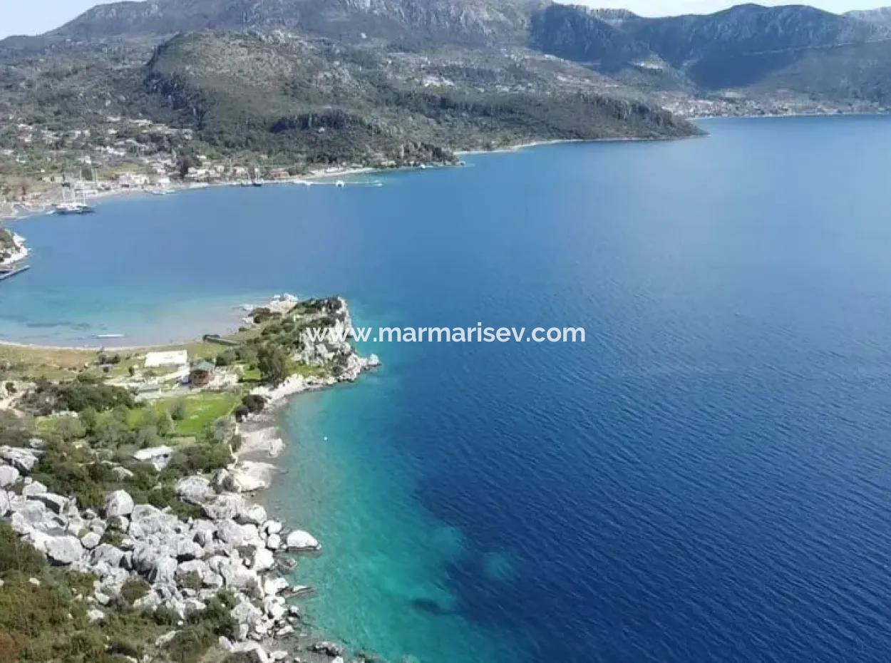 Grundstück Mit Meerblick Zum Verkauf Im Dorf Söğüt Im Bezirk Marmaris, Geeignet Für Investitionen 50 Meter Vom Meer Entfernt