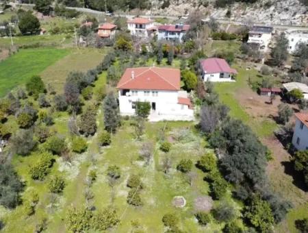 Farmhouse Among Olive Groves With 10 Rooms In A Plot Of 3700M2 Close To The Sea In The Orhaniye Neighborhood Of Marmaris From The Real Estate Agent