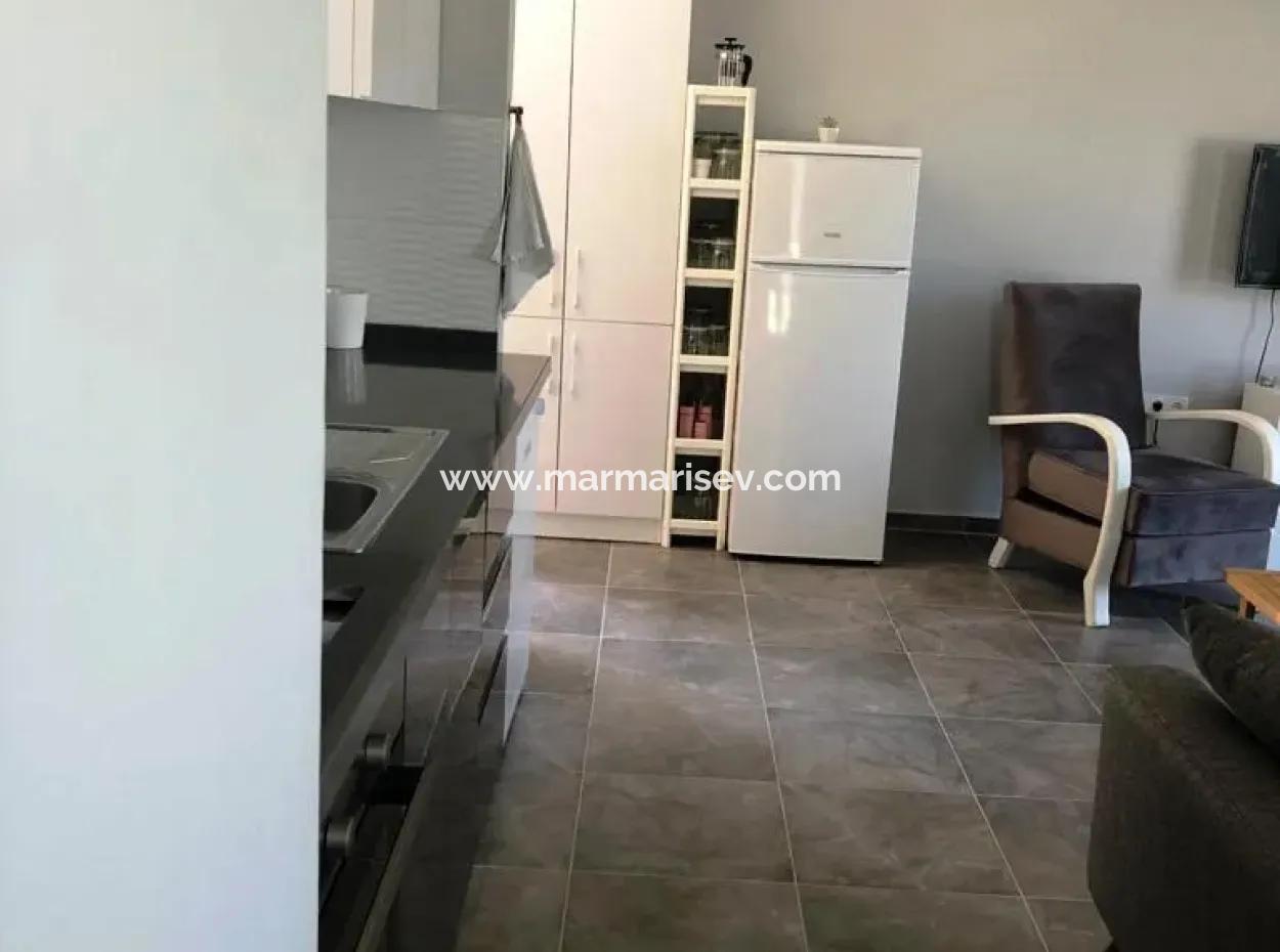 Datça Merkezinde Denize 400 Metre Mesafede Yüzme Havuzlu Site İçerisinde 2 Oda 1 Salon Açık Mutfak 100 M2 Satılık Daire